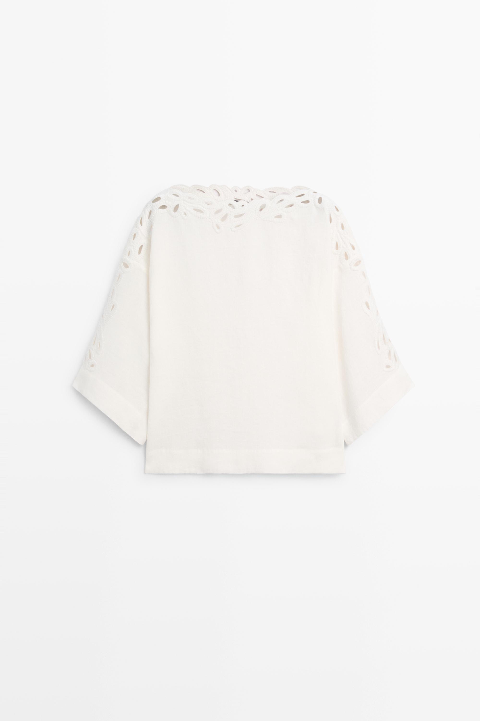 Linen boat neck blouse with embroidery